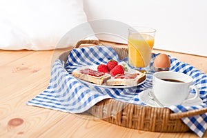 Homemade breakfast on wicker tray photo