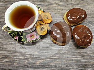 Brownies and a Cup of tea with dried fruits