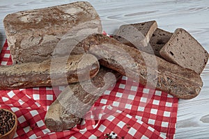 Homemade buckwheat bread. Gluten-free bread. Freshly baked traditional bread on wooden table. Rustic bread with buckwheat. Organic