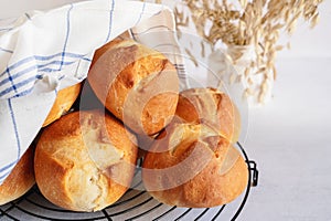 homemade buns. Homemade buns on wood board with wheat ears. Homemade Dinner Rolls, selective focus