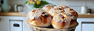 homemade buns with sesame seeds in a basket. Selective focus.