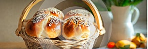 homemade buns with sesame seeds in a basket. Selective focus.