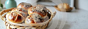 homemade buns with sesame seeds in a basket. Selective focus.