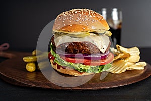 Homemade burger on a dark background