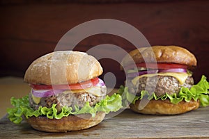 Homemade burger with meat patty and vegetables