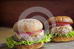 Homemade burger with meat patty and vegetables