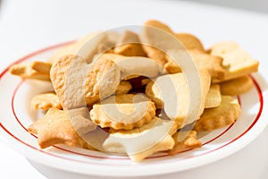 Homemade butter cookies on a dish in beautiful sunlight