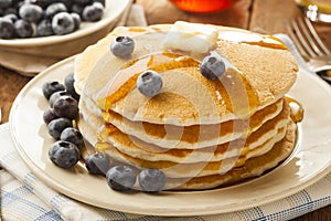 Homemade Buttermilk Pancakes with Blueberries and Syrup