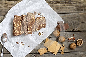 Homemade cake with chocolate nuts and biscuits