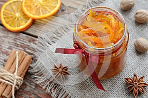 Homemade candied peels orange jam in glass jar