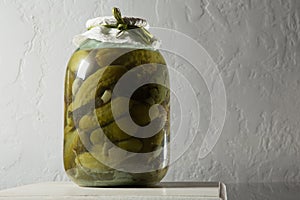 homemade canned cucumbers in glass jar