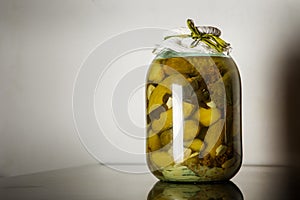 homemade canned cucumbers in glass jar