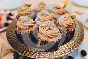 Homemade Carrot Cupcakes with Cream Cheese Frosting for Easter.