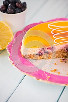 Homemade cheescake on pink plate