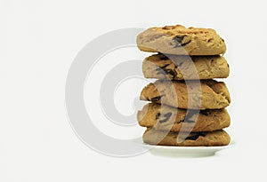 Homemade chocolate cookies. A stack of delicious chocolate chip cookies on a gray table.