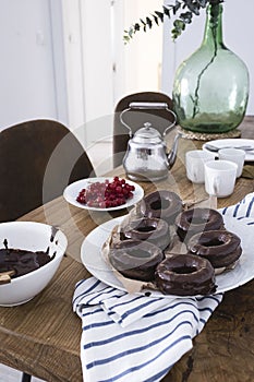 Homemade chocolate donuts. Healthy donuts with no added sugar. photo
