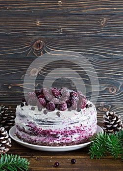 Homemade chocolate and frozen  brambles cake close up