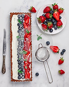 Homemade chocolate tart with fresh berries