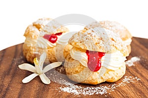 Homemade Choux pastry with cream and crimson curd