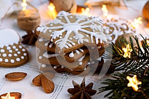 Homemade Christmas gingerbread cookies with decorations and Ñhristmas lights