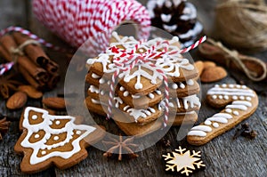 Homemade christmas gingerbread on a wooden background with star anise and almond