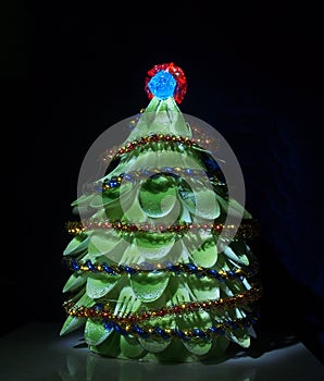 Homemade Christmas tree. The tree is made of plastic forks and s