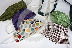 Homemade cloth face masks in different styles and colors