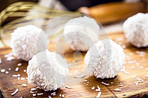 Homemade coconut candy, sugarless white coconut balls made with coconut milk, vegan sweet