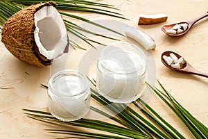 Homemade coconut cream - still life with spoon - on beige background