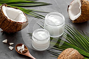 Homemade coconut cream - still life with spoon - on grey background