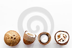Homemade coconut cream on white background top-down frame copy space