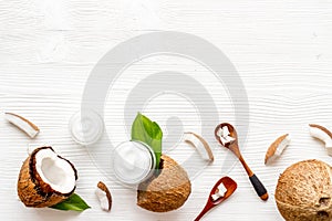 Homemade coconut cream on white wooden background top-down frame copy space
