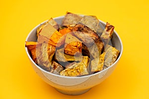 Homemade Cooked Sweet Potato with spices and herbs in smal bowl