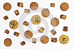 Homemade cookies with chocolate, nuts and coffee beans on a white background.