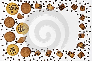 Homemade cookies with chocolate, nuts and coffee beans on a white background.