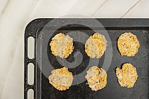 Homemade cookies with chocolate, nuts, raisins, milk on a wooden background. Breakfast.