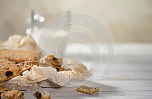 Homemade cookies with chocolate, nuts on a wooden background