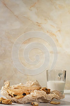 Homemade cookies with chocolate, nuts on a wooden background