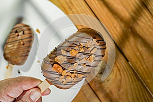 Homemade cookies with chocolate, nuts on a wooden table and an art background in the morning. Close up. Breakfast.