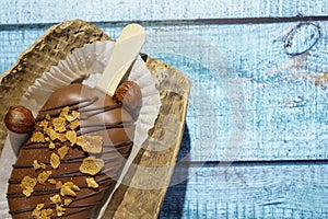 Homemade cookies with chocolate, nuts on a wooden table and an art background in the morning. Close up. Breakfast.