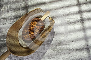 Homemade cookies with chocolate, nuts on a wooden table and an art background in the morning window light. Close up. Breakfast.