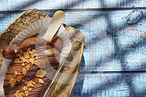 Homemade cookies with chocolate, nuts on a wooden table and an art background in the morning window light. Close up. Breakfast.