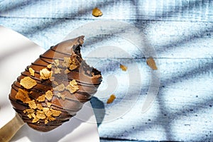 Homemade cookies with chocolate, nuts on a wooden table and an art background in the morning window light. Close up. Breakfast.