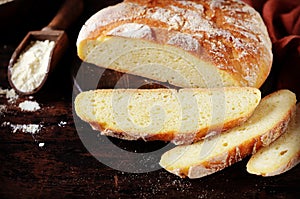 Homemade corn bread on a dark wooden table