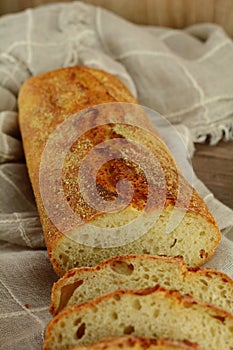 Homemade Corn Flour Loaf of Bread - on wooden background