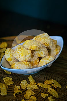 Homemade Cornflake cookies on a wooden background