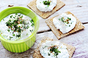 Homemade cottage cheese spread and rye loaves sandwiches photo