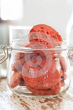 Homemade cranberry cookies in widemouthed glass jar