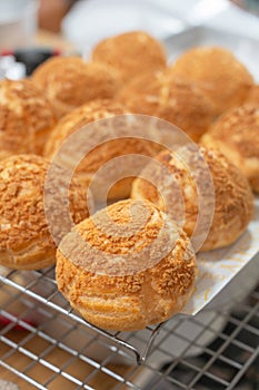 Homemade Craquelin Choux biscuits crispy cream puffs photo