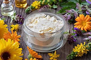 Homemade cream from herbs, essential oils and shea butter
